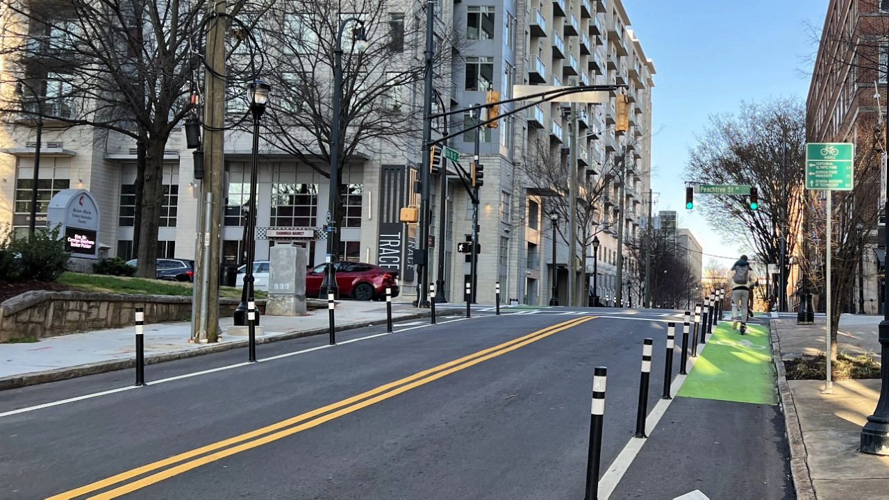 Protected bike lanes along both sides of 5th Street