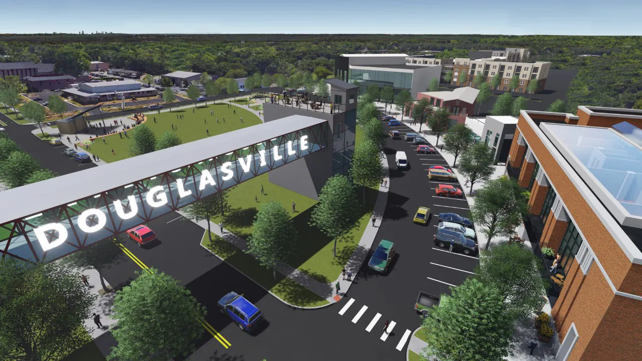 Douglasville Downtown Master Plan & 10-year Strategic Plan by TSW, Atlanta - 3D rendering of commercial area facing the downtown green with a pedestrian bridge