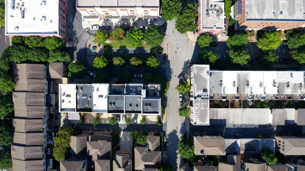 Glenwood Park a new urbanism Sustainable Community Development by TSW -overhead aerial view showing the alley loaded nature and the tree lined streets of the design 